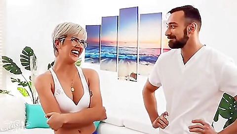 Busty brunette is getting fucked in a massage class