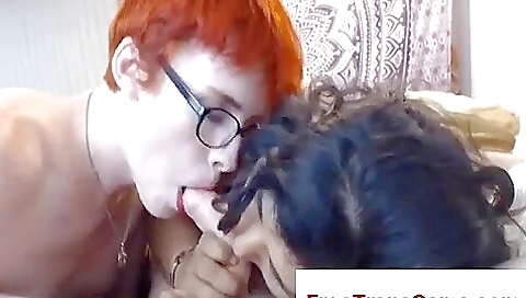 Redheaded hot wife giving a blowjob to guy and handjob