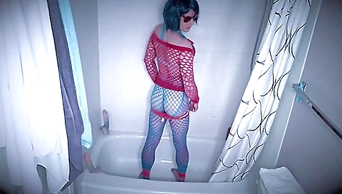 Latina in stockings shows off her body in the shower